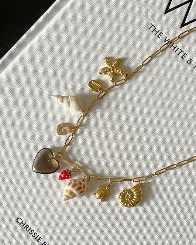 White Hermit Shell Charm