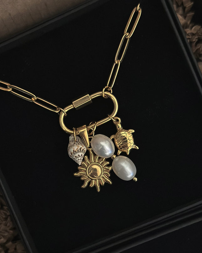 Spiral Hermit Shell Charm